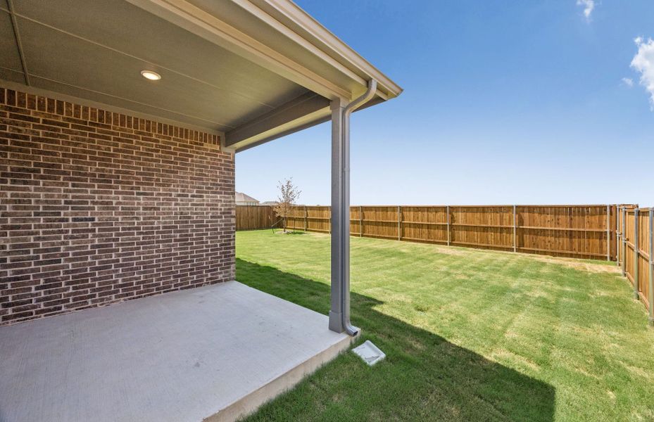 Exterior details and patio area of a home in Pinnacle at Legacy Hills, Celina (Image 2).