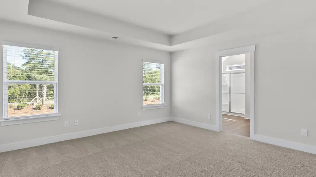 Spacious, unfurnished interior of a new home in The Highlands at Cedar Hill Landing, Navassa (Image 24).