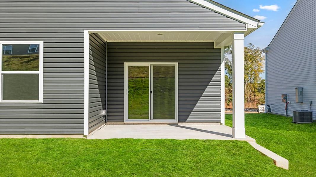 Exterior details and patio area of a home in Durbin Meadows Traditions, Fountain Inn (Image 17). Exterior details and patio area of a home in Durbin Meadows Traditions, Fountain Inn (Image 17).