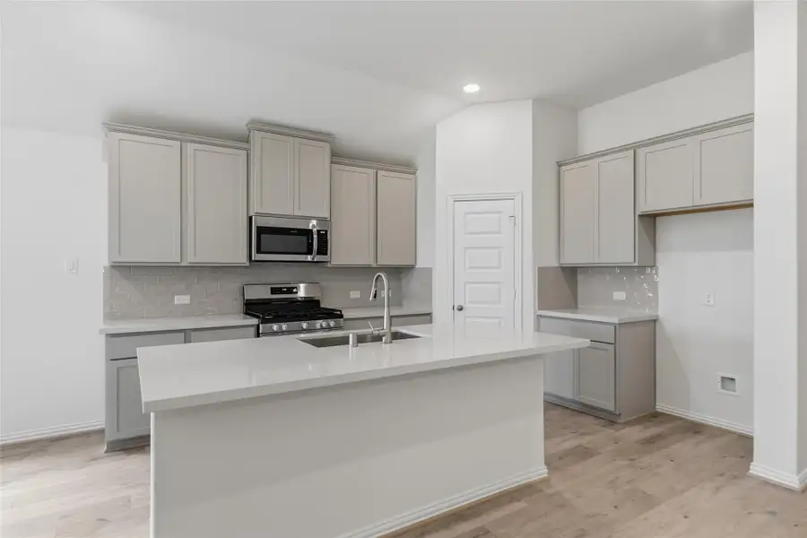 Furnished interior view inside a new home in Westland Ranch, League City (Image 11).