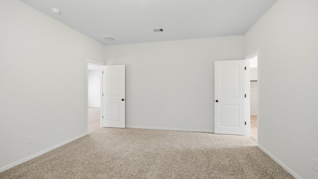 Representative unfurnished interior of a home built from the Perry by D.R. Horton in New Waverly Station, New Waverly (Image 16).
