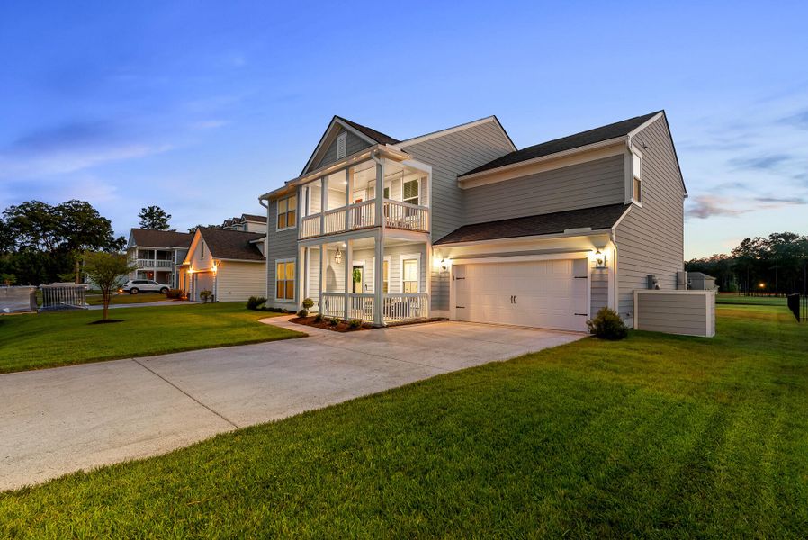 Front exterior of a new home in Sea Island Preserve, Johns Island, SC, highlighting curb appeal (Image 28). Front exterior of a new home in Sea Island Preserve, Johns Island, SC, highlighting curb appeal (Image 28).