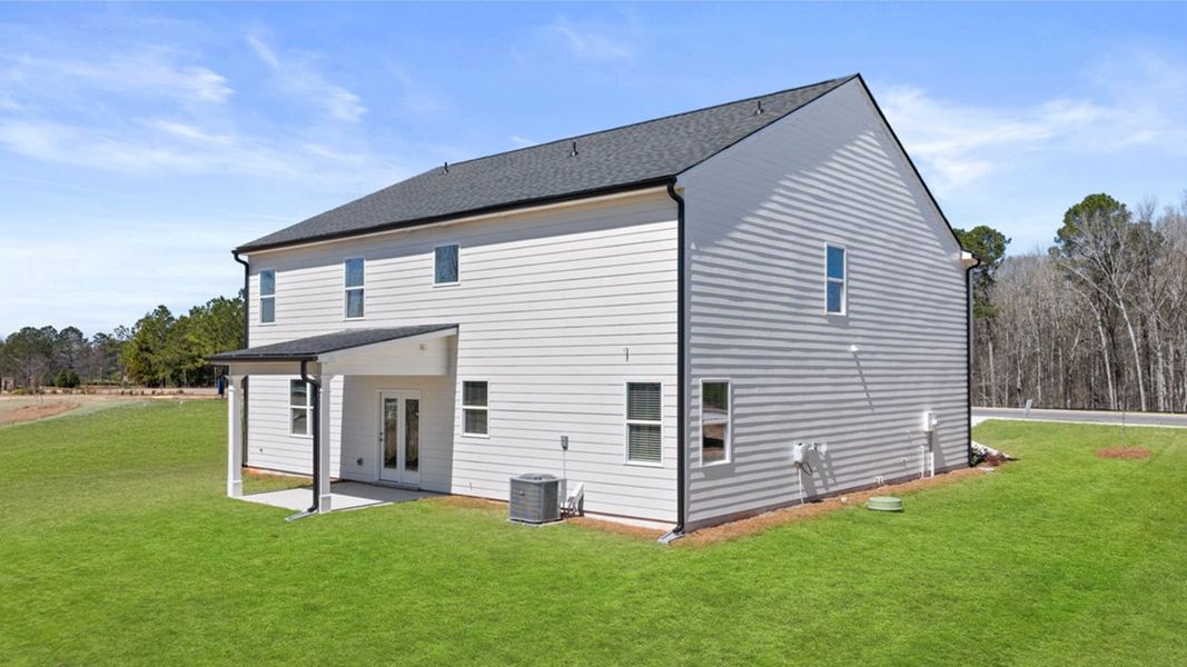 Exterior details and patio area of a home in The Abbey at Trolley Run Station, Aiken (Image 3).