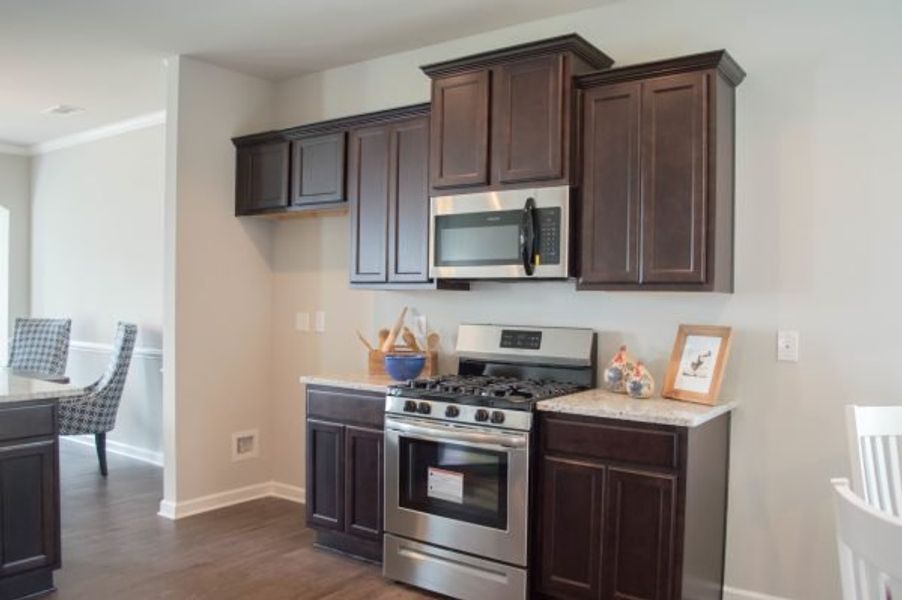 Representative furnished interior of a home built from the Poplar by Piedmont Residential in Falls Creek, Flowery Branch (Image 8).