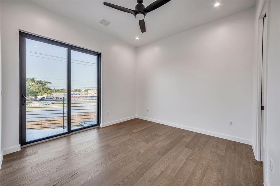 A spacious guest bedroom that opens to the private terrace, combining indoor comfort with outdoor allure.