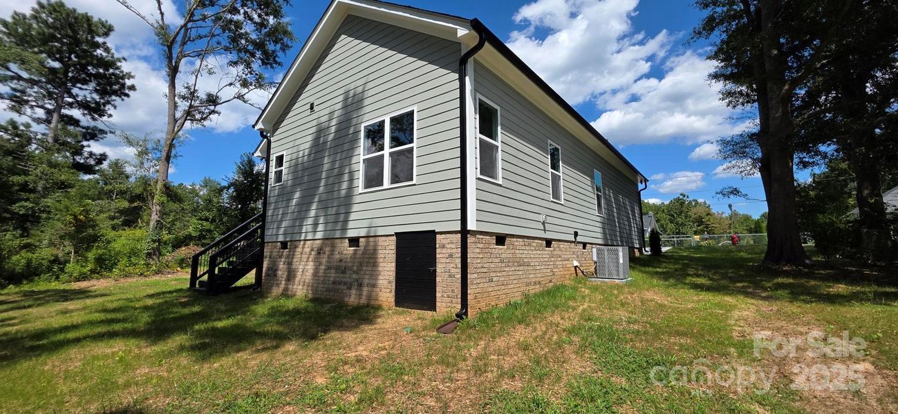 Front exterior of a new home in , Gastonia, NC, highlighting curb appeal (Image 2).