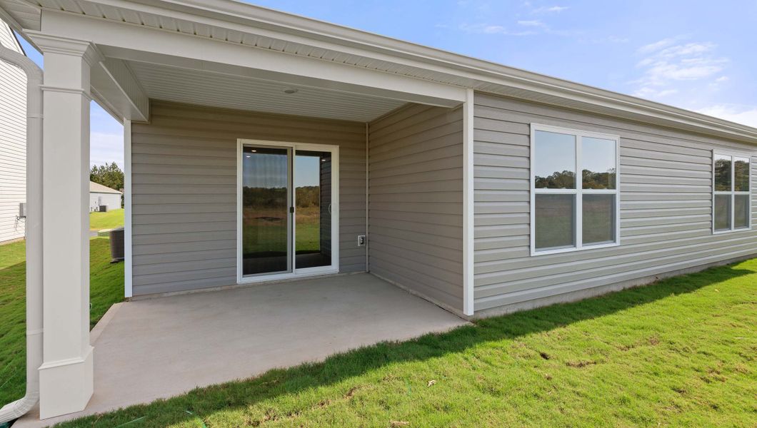 Exterior details and patio area of a home in Lightwood Cottages, Moore (Image 3).