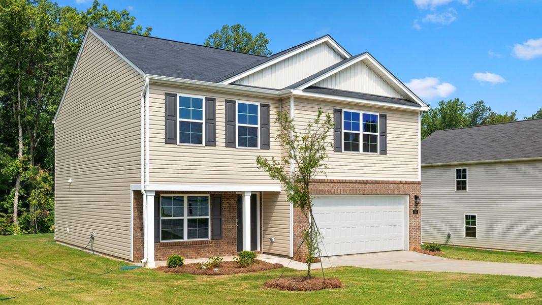 Front exterior of a new home in Owens Ridge, Lexington, NC, highlighting curb appeal (Image 2). Front exterior of a new home in Owens Ridge, Lexington, NC, highlighting curb appeal (Image 2).