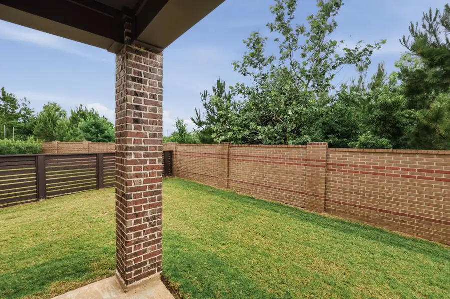 Exterior details and patio area of a home in Bridgeland Central, Cypress (Image 4).