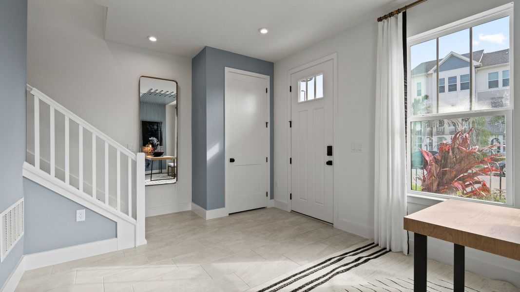 Furnished interior view inside a new home in Parkview at Hamlin, Winter Garden (Image 5).