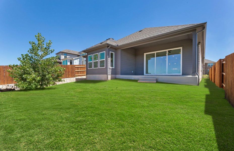 Exterior details and patio area of a home in West Cypress Hills, Spicewood (Image 21).