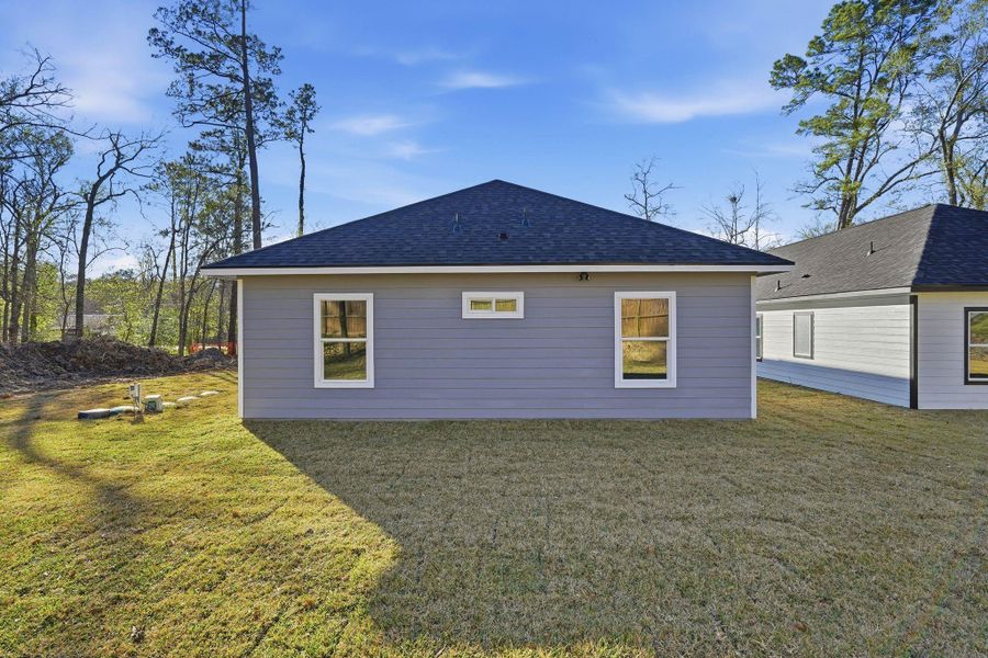 Exterior details and patio area of a home in , Willis (Image 21).