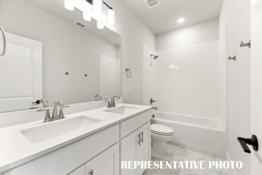 Guests will enjoy their own space in this thoughtfully designed guest bath.  REPRESENTATIVE PHOTO