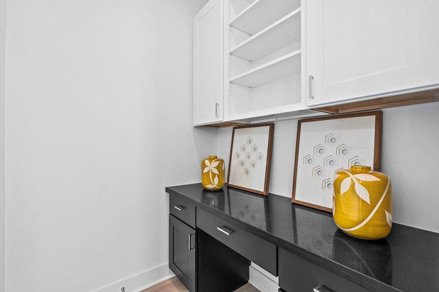 Convenient work space adjacent to kitchen.