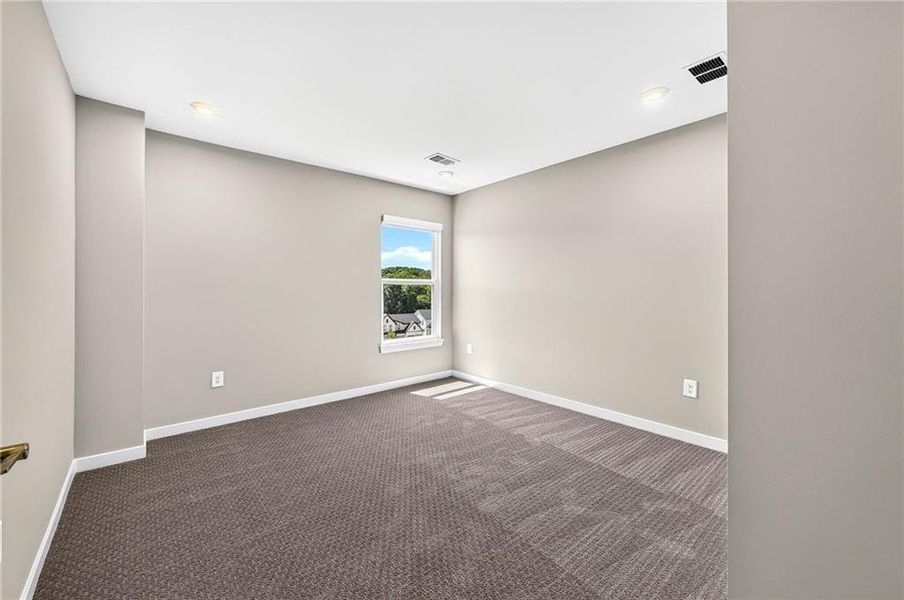 Spacious, unfurnished interior of a new home in The Reserve At Liberty Park, Braselton (Image 46).