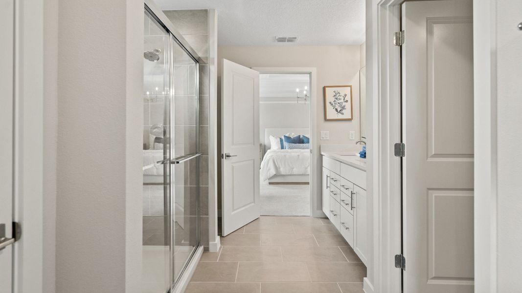 Primary En Suite Bath in Ponte Vedra New Home Plan in Hamilton Bluff in Haines City, FL by DRB Homes