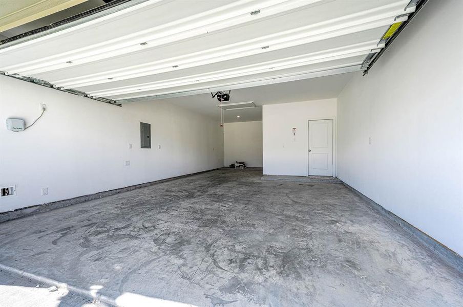 This home features a 2 car garage with extra storage room.