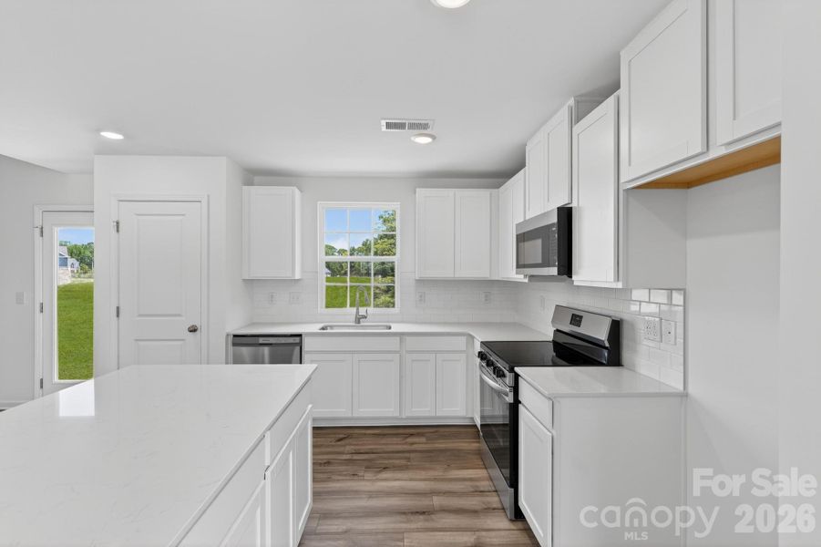 Furnished interior view inside a new home in Creekside Cottages, Bessemer City (Image 9).