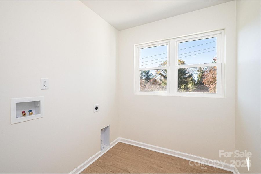 Spacious, unfurnished interior of a new home in , Hickory (Image 9).