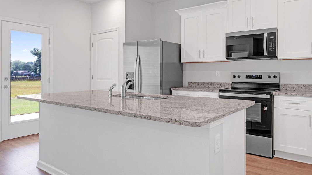 Furnished interior view inside a new home in Huntington Estates, Millington (Image 8).