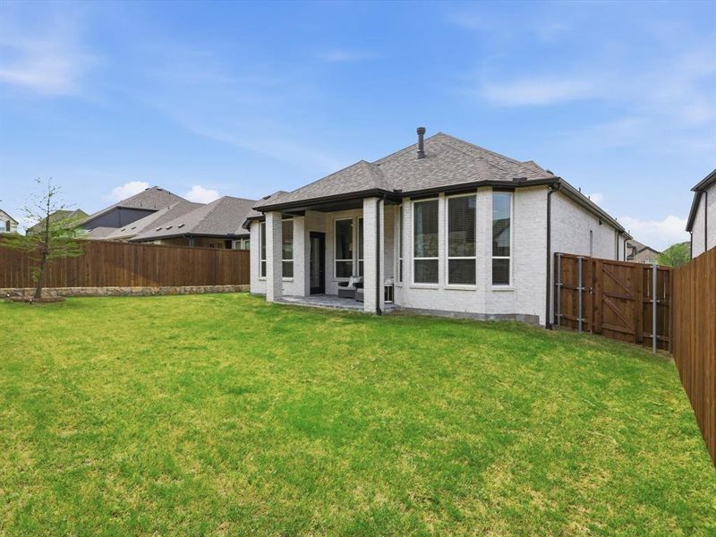 Exterior details and patio area of a home in Thompson Farms, Van Alstyne (Image 24).