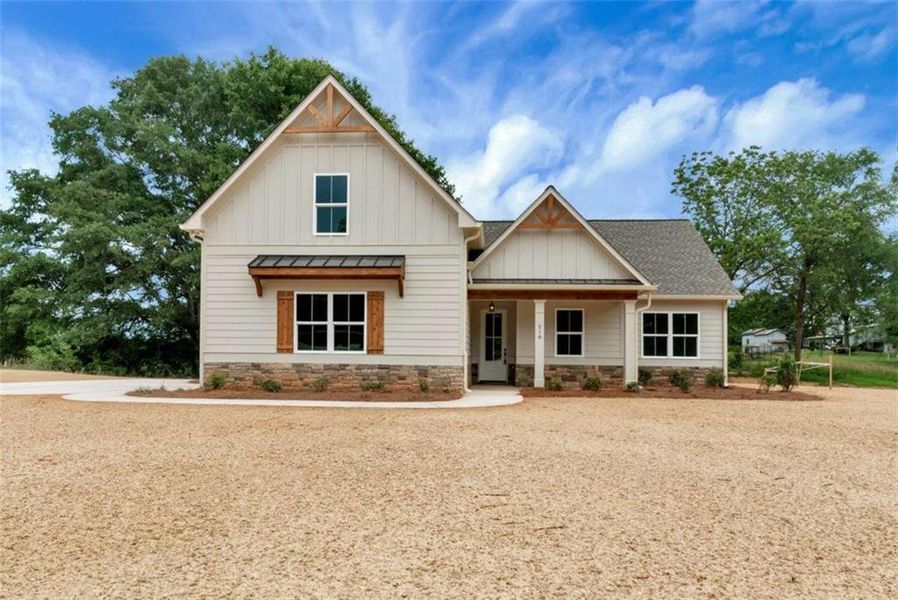 Front exterior of a new home in , Maysville, GA, highlighting curb appeal (Image 21).