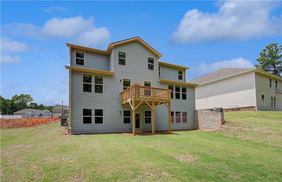 Front exterior of a new home in Kingston, Locust Grove, GA, highlighting curb appeal (Image 21).