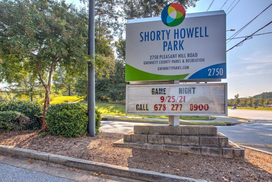 Front exterior of a new home in Riversong, Duluth, GA, highlighting curb appeal (Image 1).