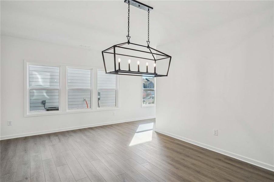 Spacious, unfurnished interior of a new home in Eastlyn Crossing - Single Family, Flowery Branch (Image 31). Spacious, unfurnished interior of a new home in Eastlyn Crossing - Single Family, Flowery Branch (Image 31).