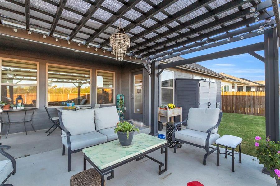 View of patio / terrace with a pergola and an outdoor living space