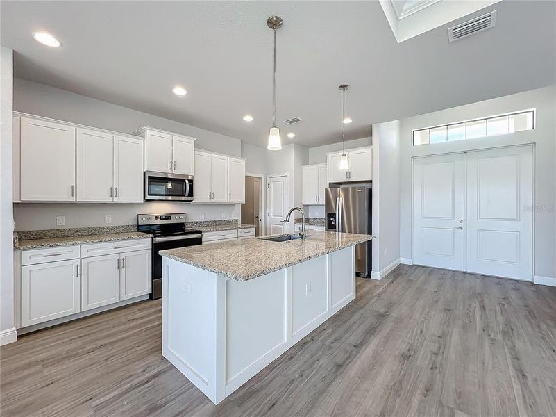 Furnished interior view inside a new home in , Punta Gorda (Image 13).