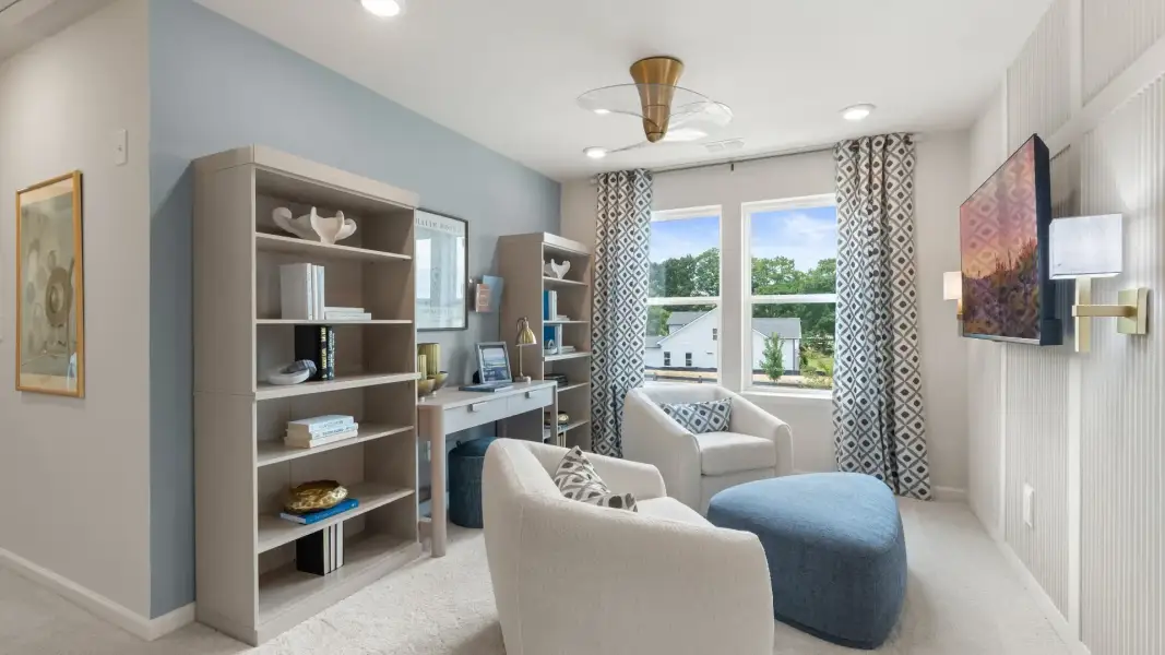 Spacious upstairs loft in new construction townhome for flexible office or lounge use with natural daylight. Spacious upstairs loft in new construction townhome for flexible office or lounge use with natural daylight.