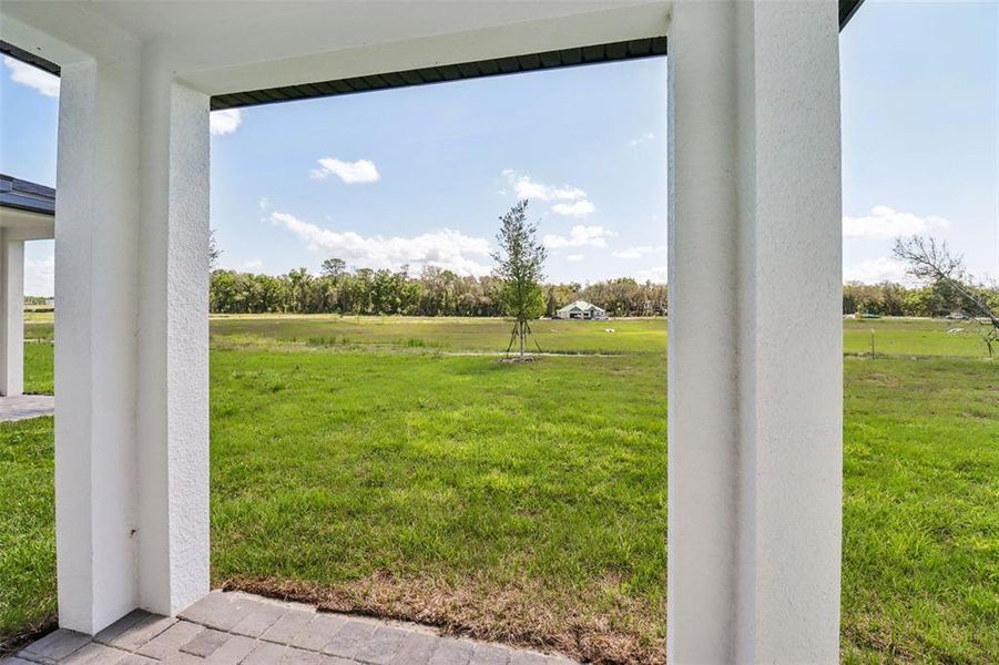 Exterior details and patio area of a home in The Reserve at Hammock Oaks - Classic Series, Lady Lake (Image 23).