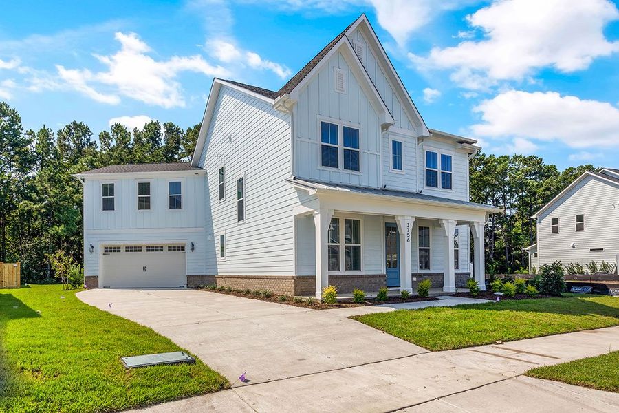 Representative exterior photo of a completed home built from the The Wentworth by RobuckHomes in East & Mason, Wilmington, NC (Image 16). Representative exterior photo of a completed home built from the The Wentworth by RobuckHomes in East & Mason, Wilmington, NC (Image 16).