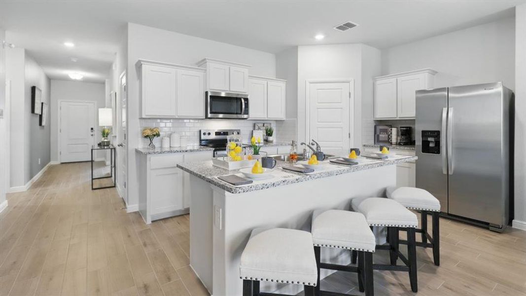 Kitchen - All Home and community information, including pricing, included features, terms, availability and amenities, are subject to change at any time without notice or obligation. All Drawings, pictures, photographs, video, square footages, floor plans, elevations, features, colors and sizes are approximate for illustration purposes only and will vary from the homes as built.