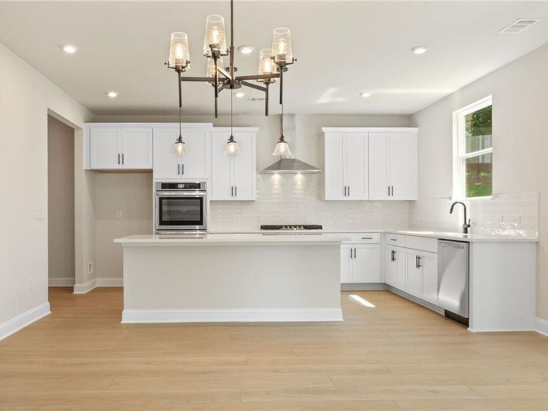 Furnished interior view inside a new home in Melody Lakeside Estates, Buford (Image 5).