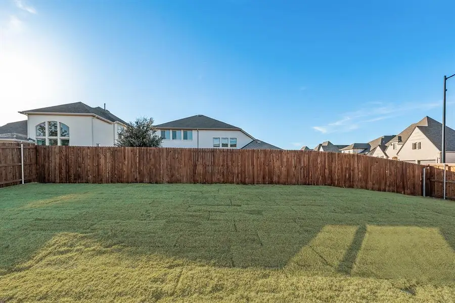 Exterior details and patio area of a home in Tavolo Park, Fort Worth (Image 3). Exterior details and patio area of a home in Tavolo Park, Fort Worth (Image 3).