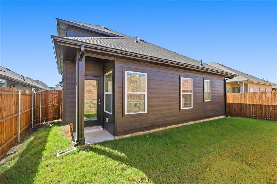 Front exterior of a new home in Aubrey Creek Estates, Aubrey, TX, highlighting curb appeal (Image 20). Front exterior of a new home in Aubrey Creek Estates, Aubrey, TX, highlighting curb appeal (Image 20).