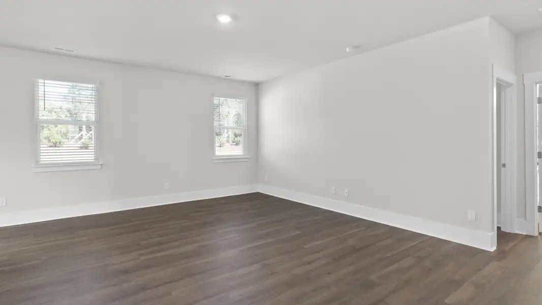 Spacious, unfurnished interior of a new home in The Highlands at Cedar Hill Landing, Navassa (Image 15).