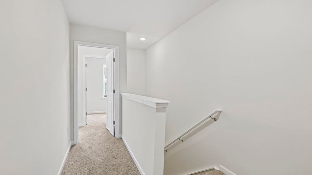 Spacious, unfurnished interior of a new home in Tanglewood Townes, Greenville (Image 21).