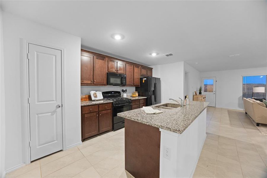 Furnished interior view inside a new home in Mobberly Farms: Watermill Collection, Pilot Point (Image 6).
