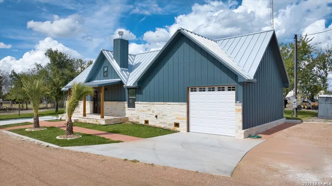 Front exterior of a new home in , Harper, TX, highlighting curb appeal (Image 2). Front exterior of a new home in , Harper, TX, highlighting curb appeal (Image 2).