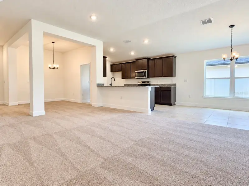 Spacious, unfurnished interior of a new home in Harmony Central, Harmony (Image 14).