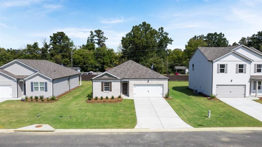 Front exterior of a new home in Northberry, Rome, GA, highlighting curb appeal (Image 20). Front exterior of a new home in Northberry, Rome, GA, highlighting curb appeal (Image 20).