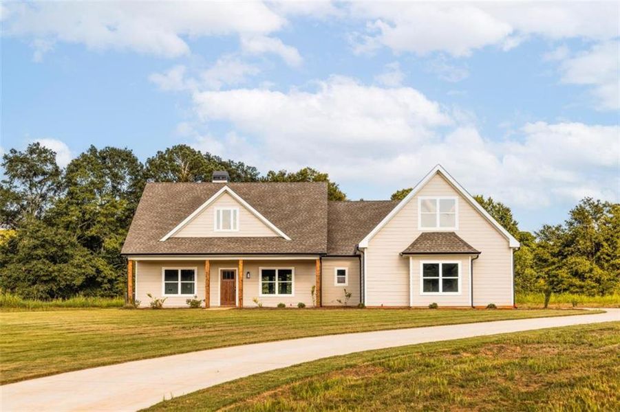 Front exterior of a new home in , Social Circle, GA, highlighting curb appeal (Image 23).