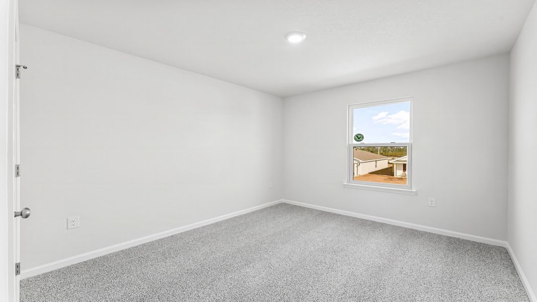 Representative unfurnished interior of a home built from the The Aisle by D.R. Horton in Titus Park, Panama City (Image 28).