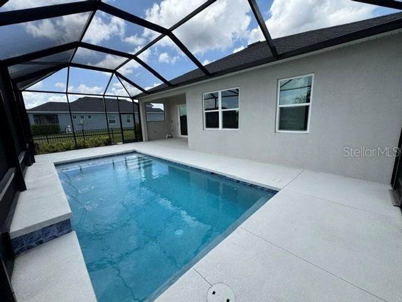Exterior details and patio area of a home in The Willows, Parrish (Image 4).