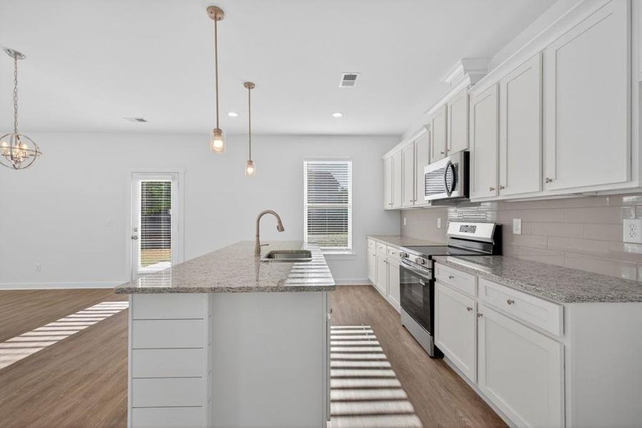 Furnished interior view inside a new home in Sutton’s Landing, Statham (Image 10).