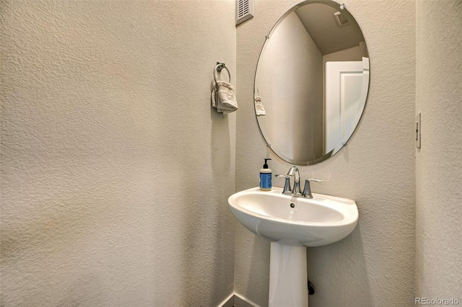 Powder room on the main level Powder room on the main level