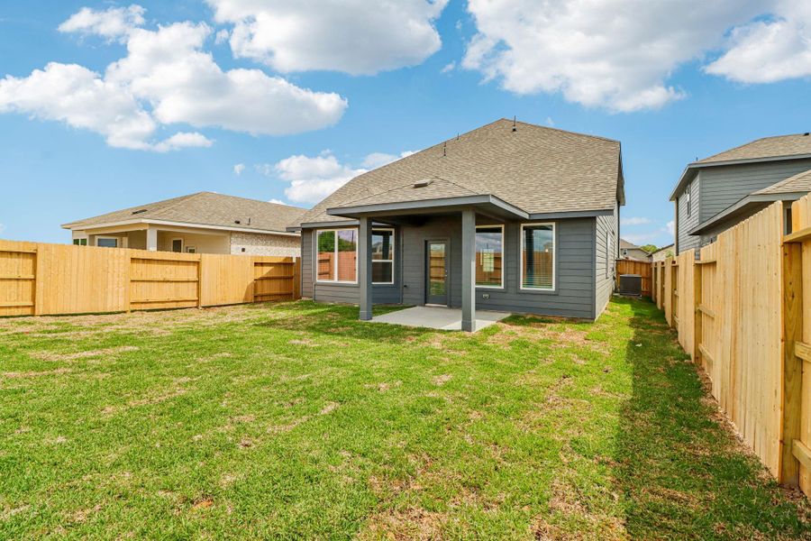Exterior details and patio area of a home in Sanford Farms - Premier Series, Waller (Image 4).